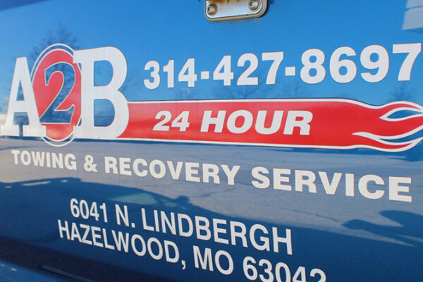 A2B Towing logo on door of tow truck
